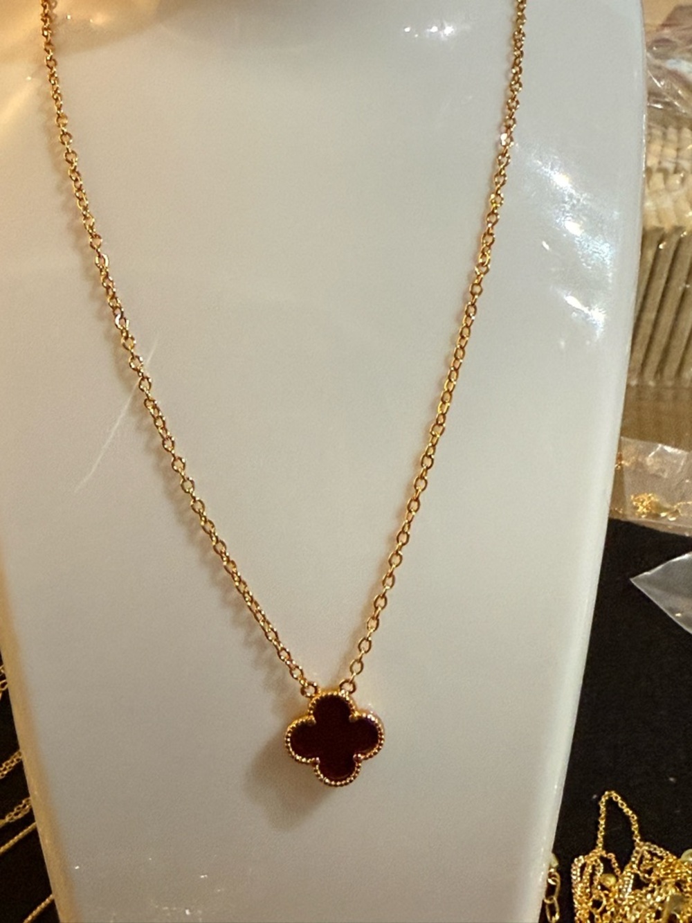 Delicate Gold Chain Necklace with Deep Red Clover Pendant